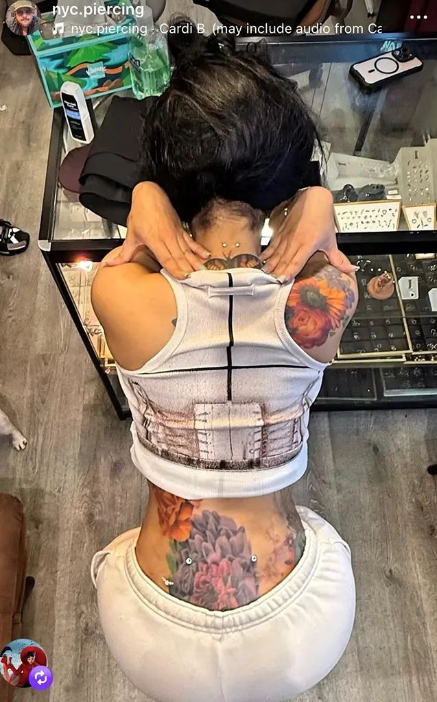Cardi B Reveals Dermal Piercings on Neck, Back